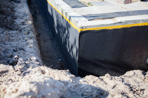 Professional Waterproofing technician working in Carthage, NY